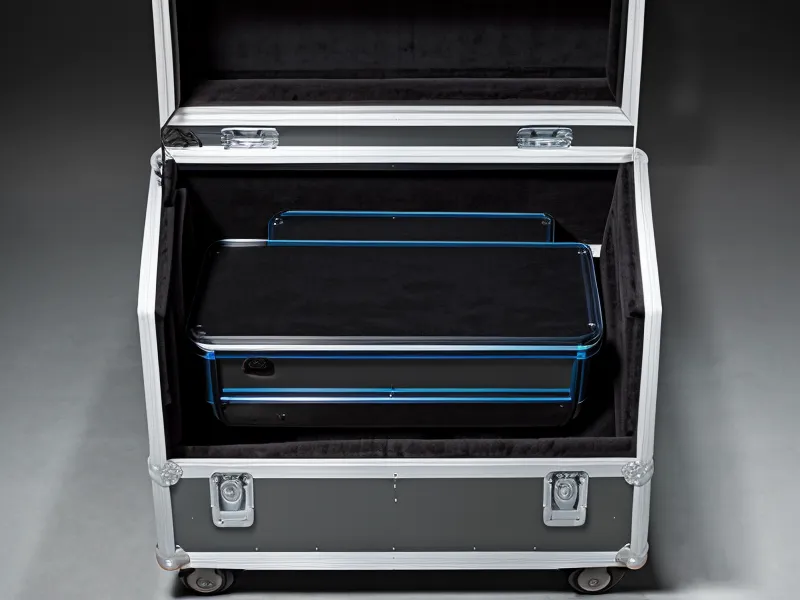 A professional equipment flight case secured for specialized transport.